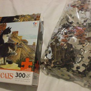Lesley Ann Ivory's  Cats on the ledge Ceaco Puzzle